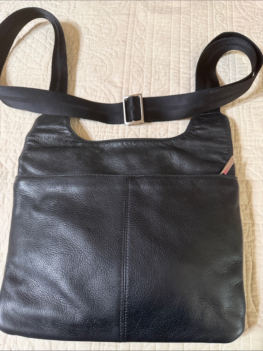 Tumi Black Leather Crossbody with Adjustable Web Strap and Front Pocket